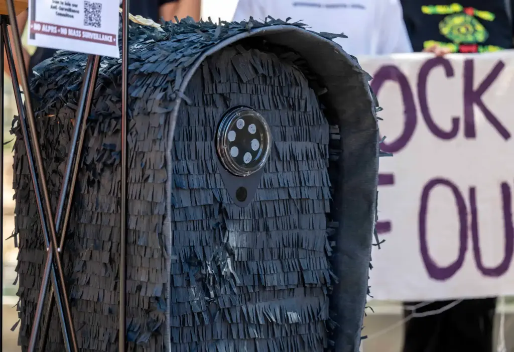 A piÃ±ata mock up of a Flock camera sits next...