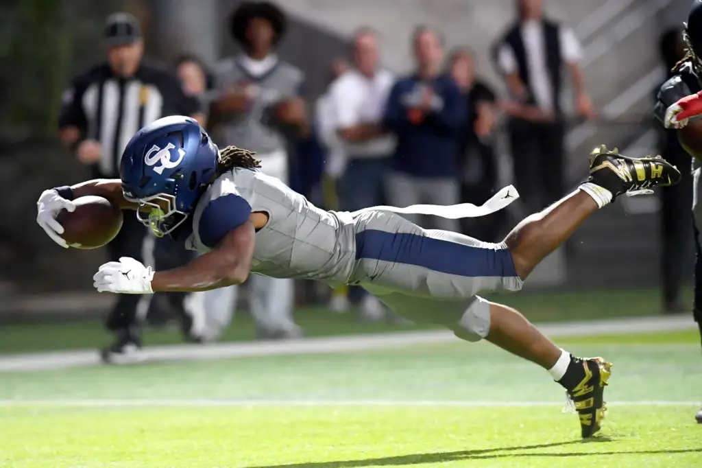 Sierra Canyonâs Jaxsen Stokes dives into the end zone for...