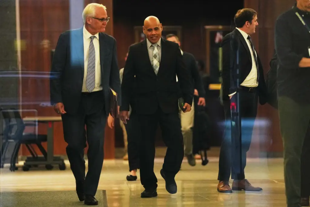 Christian Castro leaves with his attorney Daniel Gerdts.
