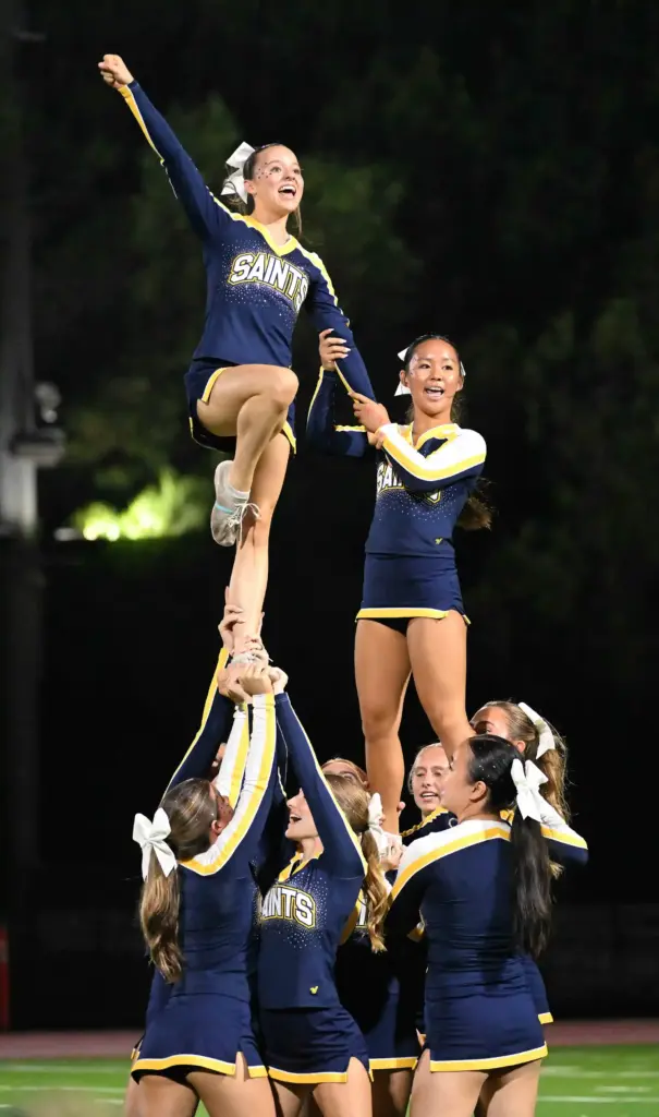 Crean Lutheranâs Song entertains the crowd during their halftime show...