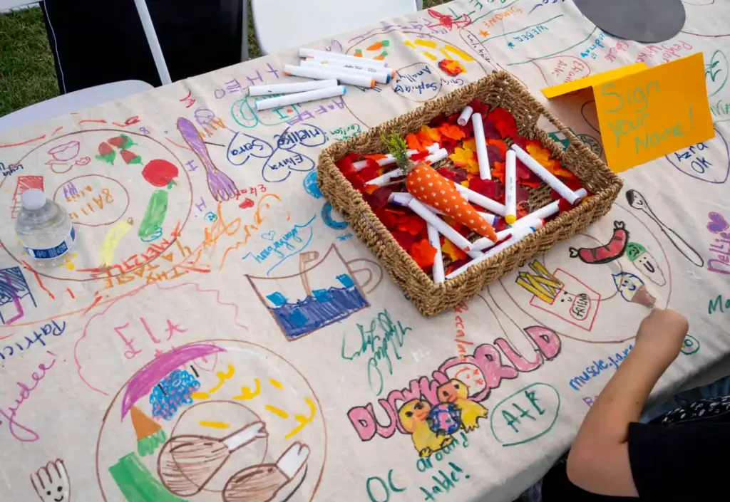 A table inviting attendees to âsign [their] name!â was decorated...