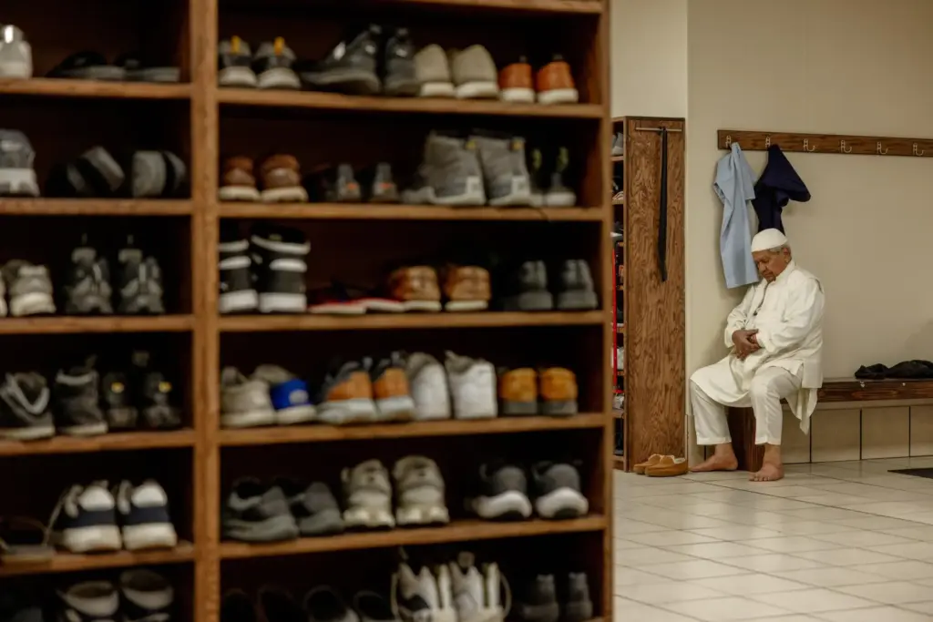 FILE – A man prays at the Islamic Society of...