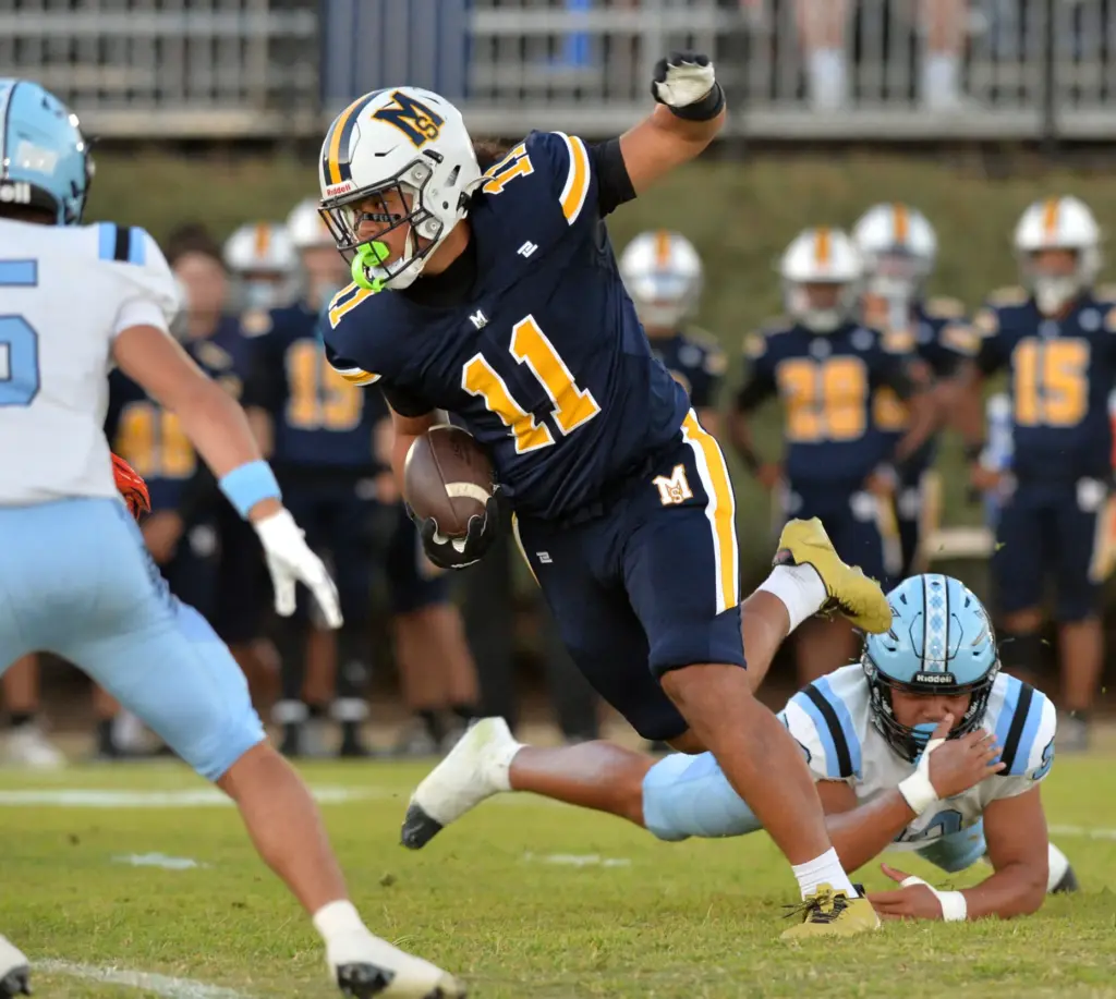Mary Star tight end TJ Amosa with yards after catch...
