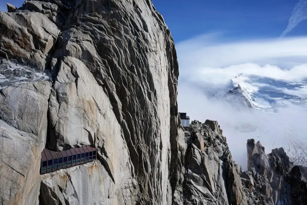 The Mont-Blanc massif mountains are seen from the Aiguille du Midi.