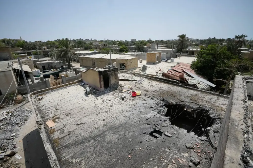 The point of impact is seen on the roof of...