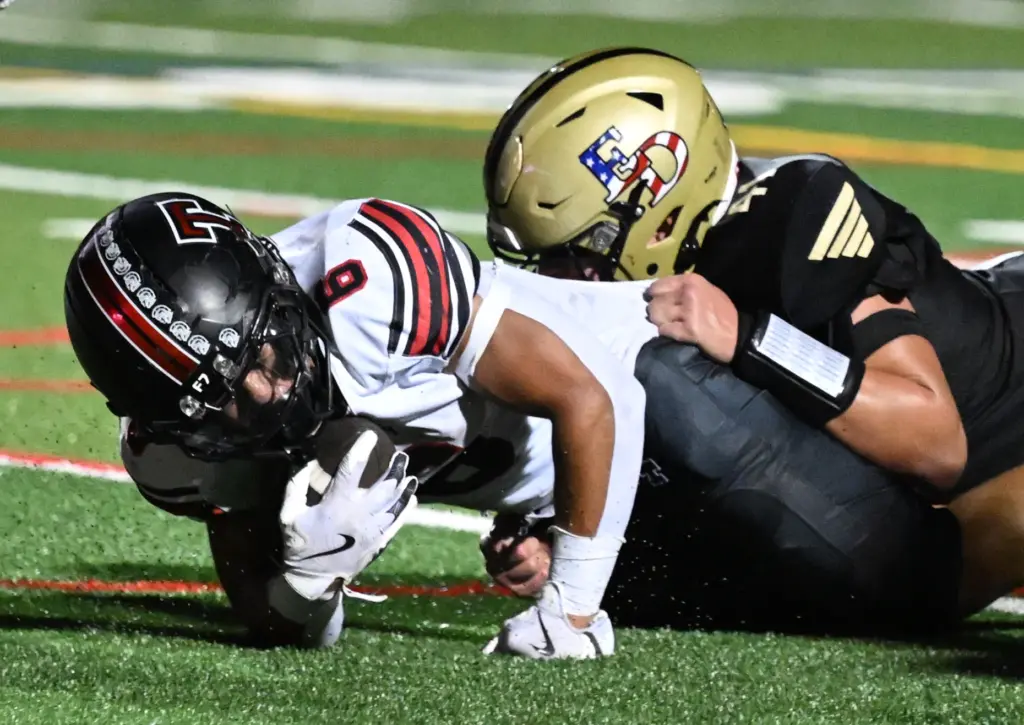 Riley Billington #6 of Troy dives for a touchdown against...