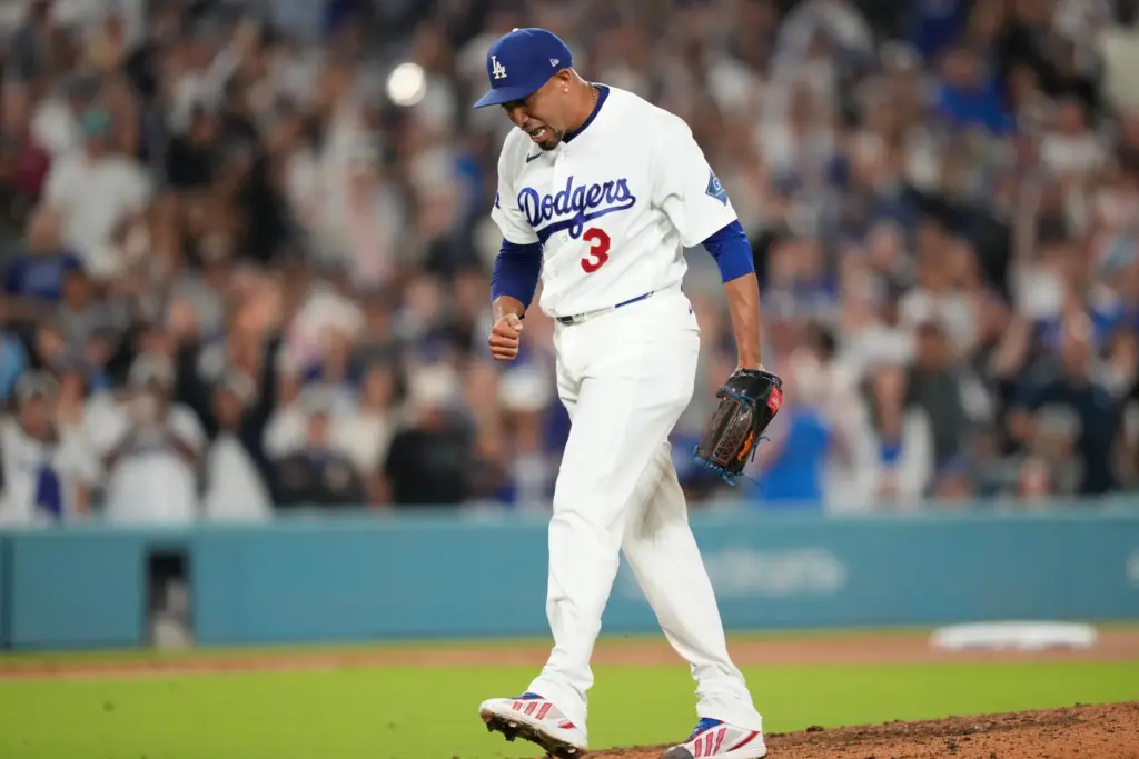 Dodgers pitcher Edwin DÃ­az celebrates after the Dodgers defeated the...