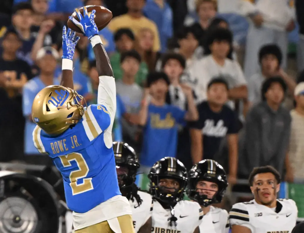 Wide receiver Brian Rowe Jr. (2) of the UCLA Bruins...