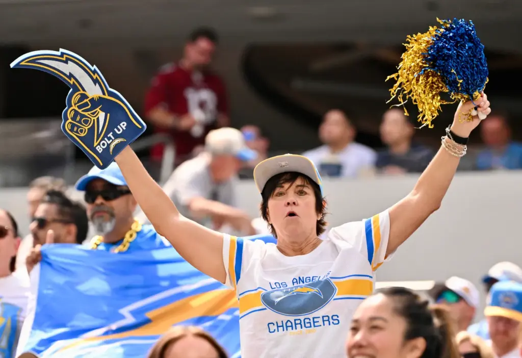 Chargers fans cheer during the first half of an NFL...