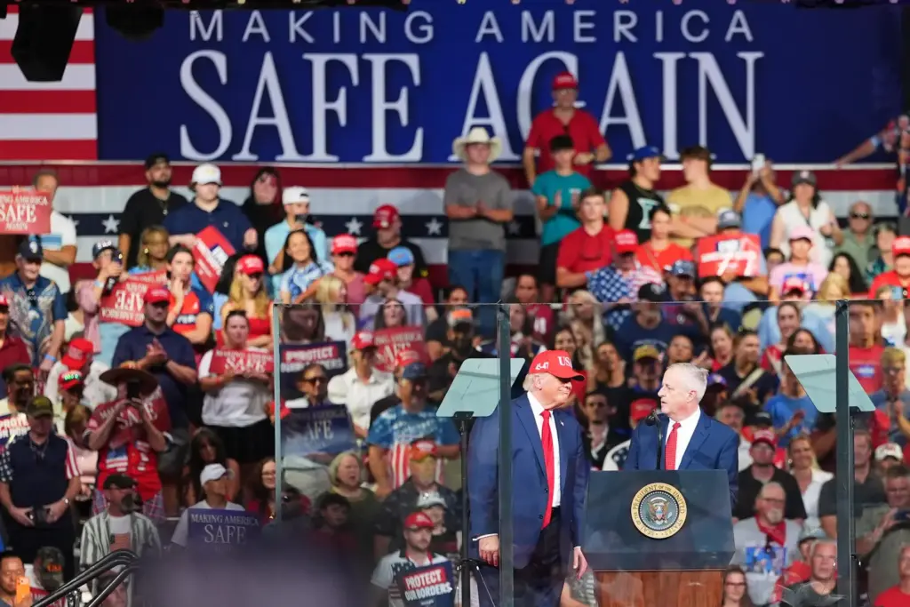 Michael Whatley, North Carolina senatorial candidate, right, and President Donald...