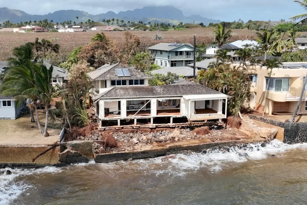 A home damaged by Hurricane Lowell is seen Thursday, Sept....