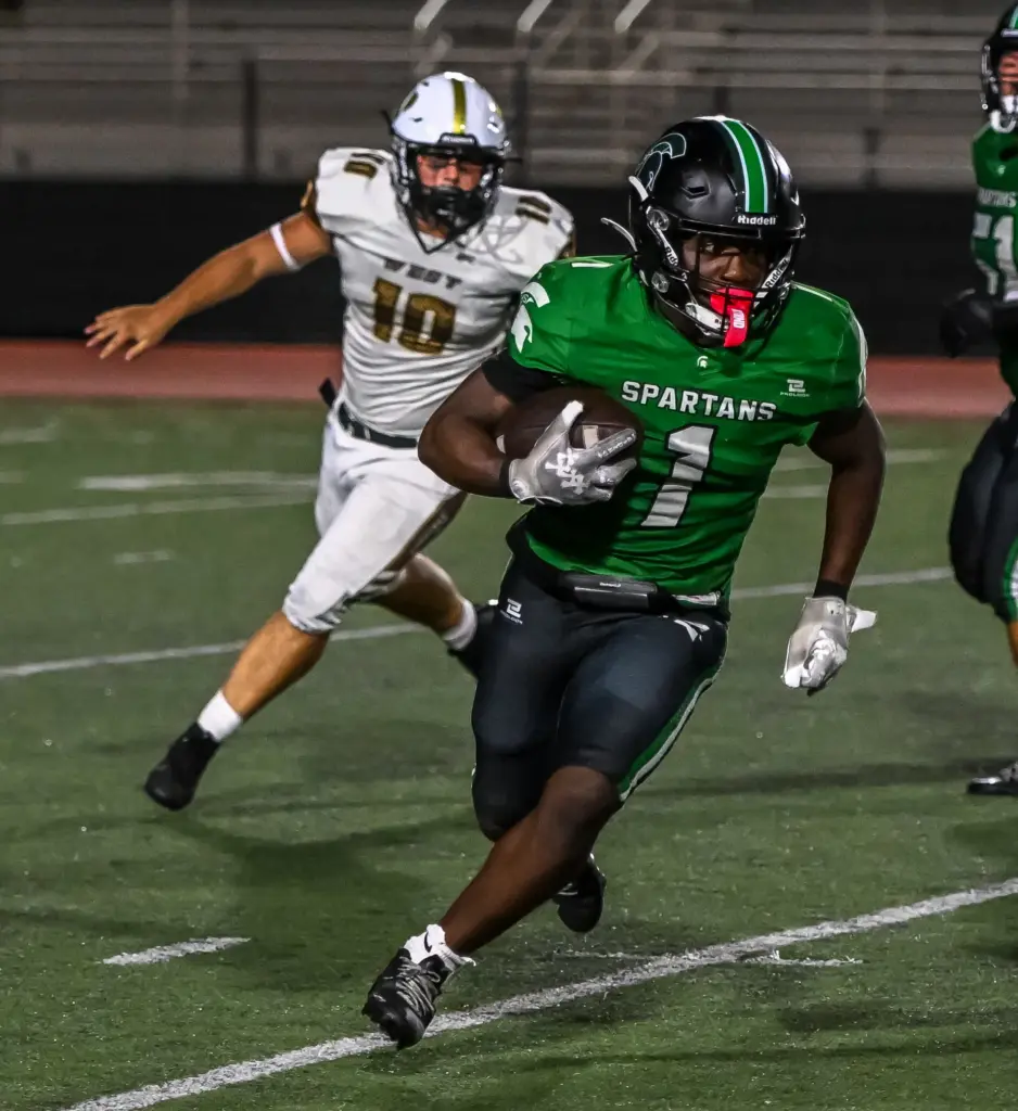 South Torrance running back Chris Noubi runs with the ball...