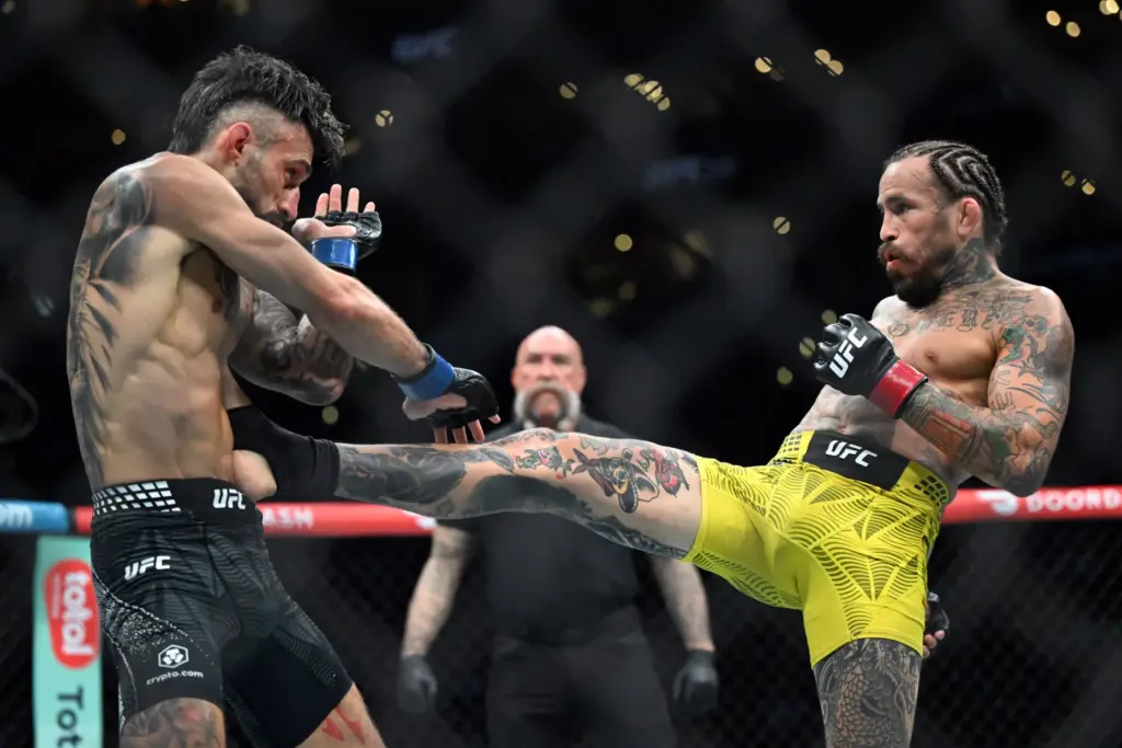 Marlon Vera (red) vs. Charles Jourdain (blue) during their fight...