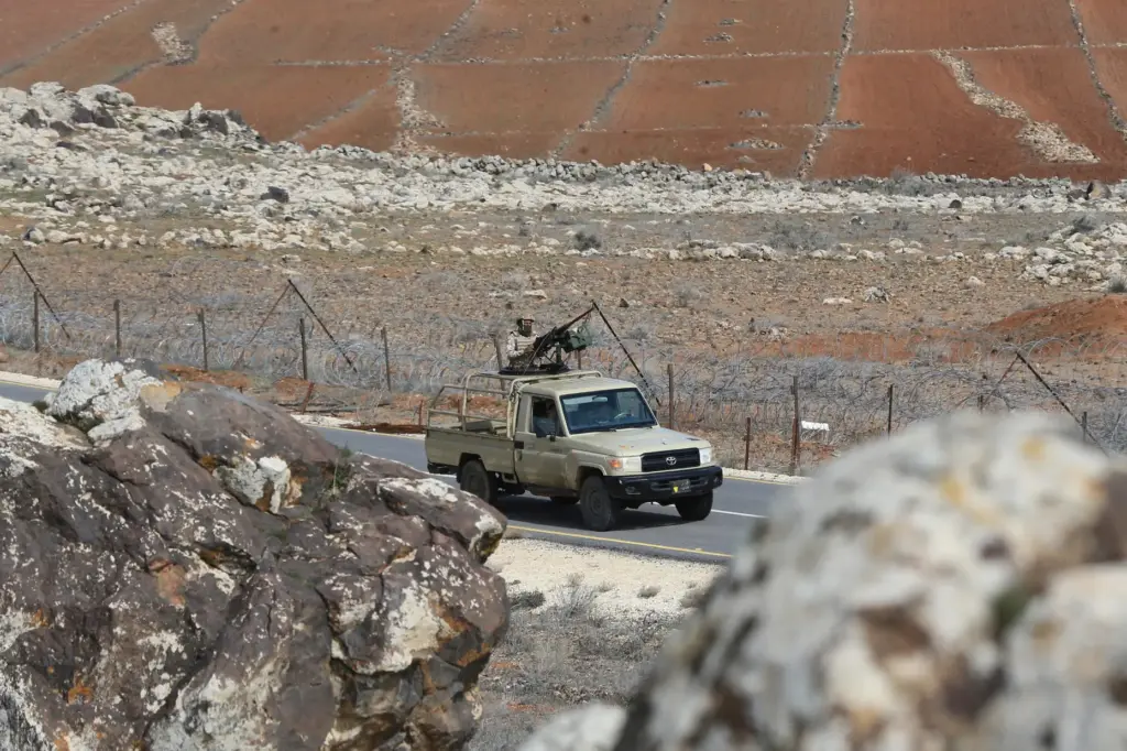 Jordanian soldiers patrol along the eastern Jordan-Syria border.