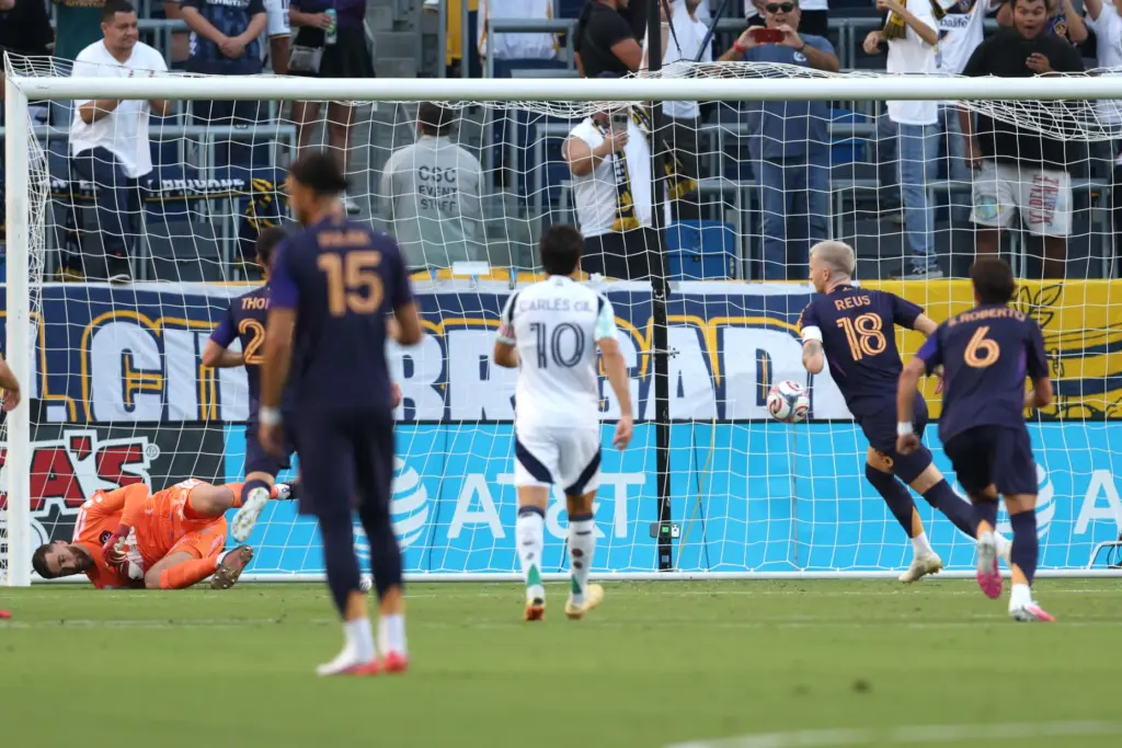 Galaxy midfielder Marco Reus (18) scores on a penalty kick...