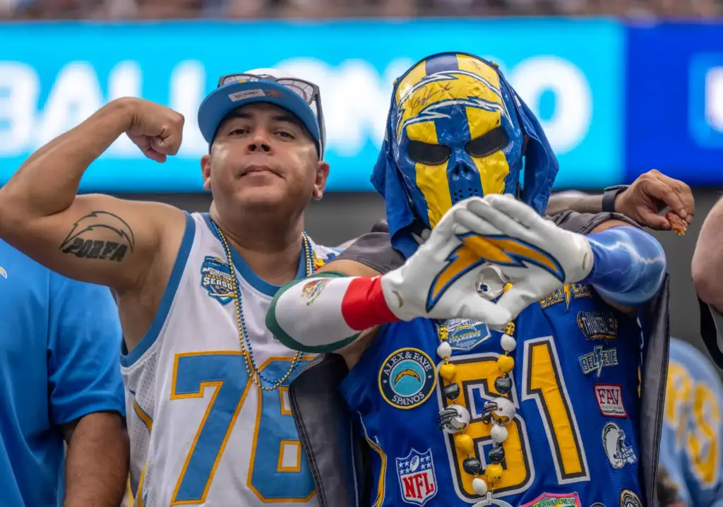 Fans cheer on the Chargers during a game against the...