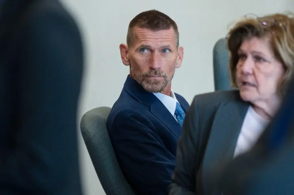 Jason Eaton appears in court during his trial in Burlington,...