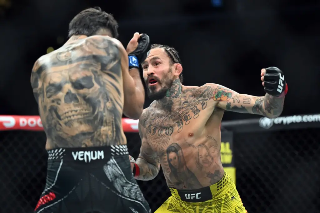 Marlon Vera (red) vs. Charles Jourdain (blue) during their fight...