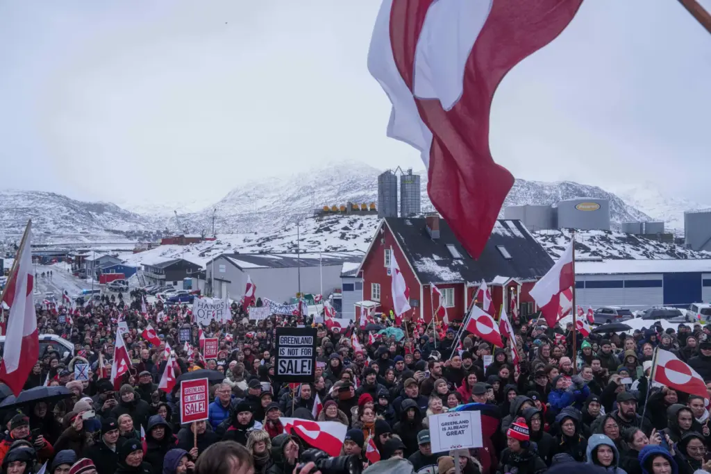FILE – People protest against Trump’s policy towards Greenland in...