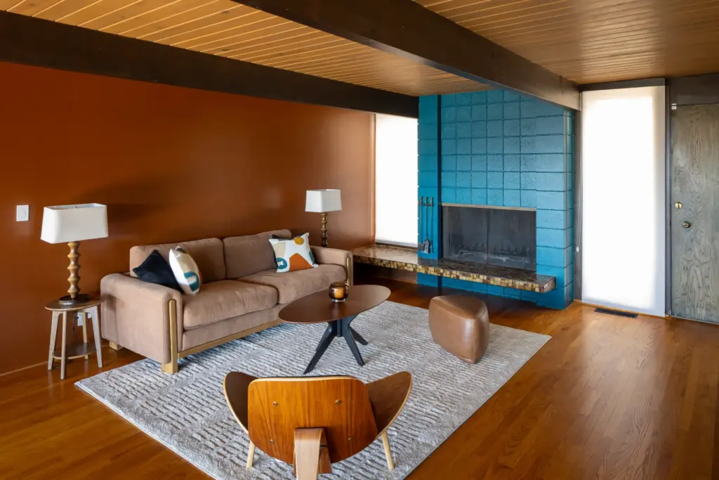 A fireplace anchors the living area. (Photo by Cameron Carothers)