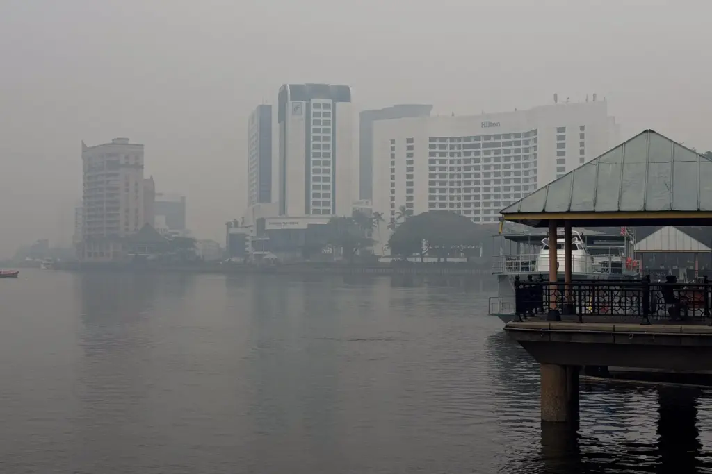 Kuching riverside in the city center is shrouded in thick...