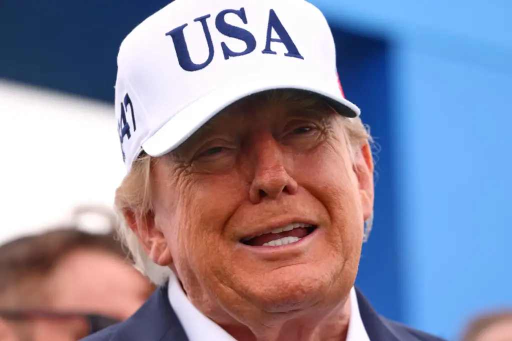 U.S. President Donald Trump arrives at the first tee during...