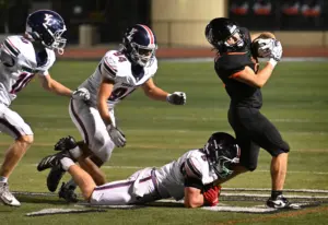 Late TD lifts Huntington Beach football to victory over Yorba Linda