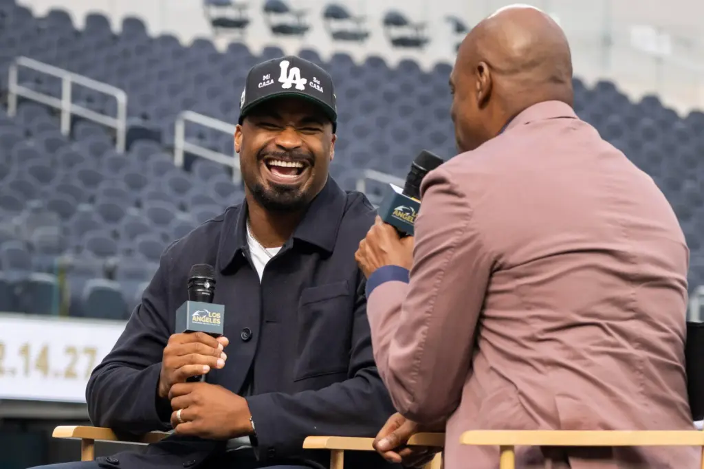 From left, Super Bowl Champion Robert Woods and Television Host...