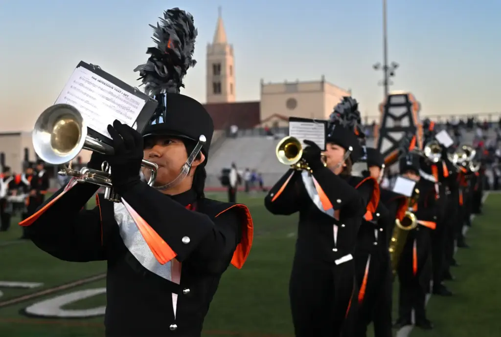 The Huntington Beach Marching Band plays the National Anthem, September...