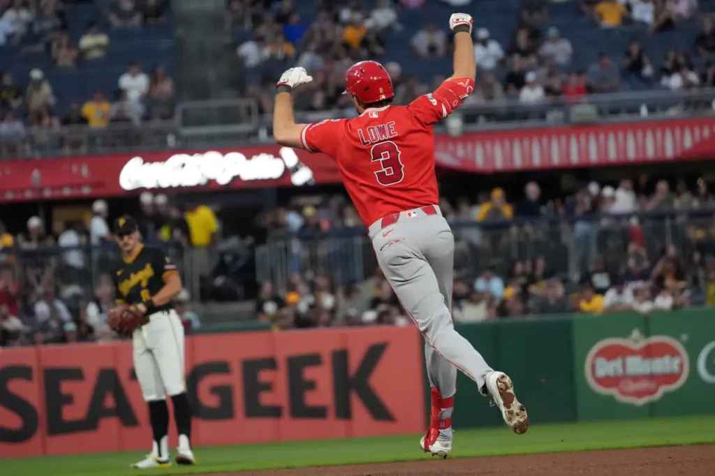 Angels’ Josh Lowe (3) celebrates while rounding the bases on...