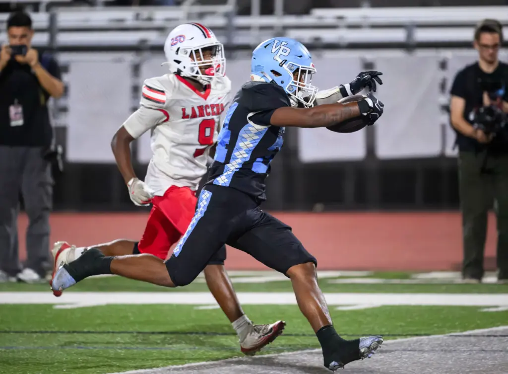 Villa Park running back Coy Collins crosses the goal line...
