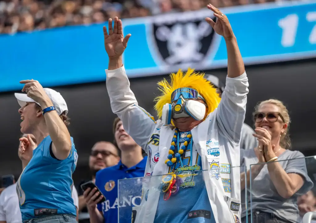 âDoc Lightningâ cheers on the Chargers during a game against...