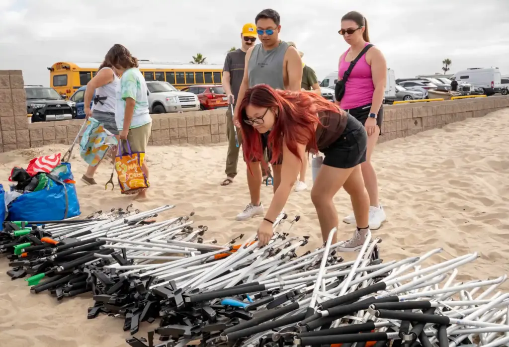 Denise Litonjua selects her trash picker before embarking on the...