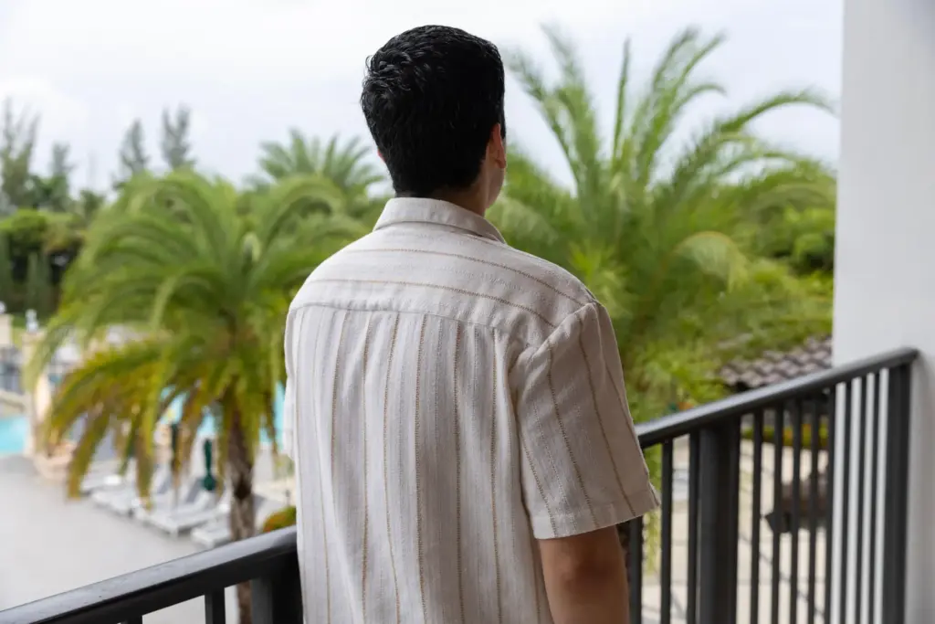 Alejandro Marquina, seen from behind, looks toward the horizon on...