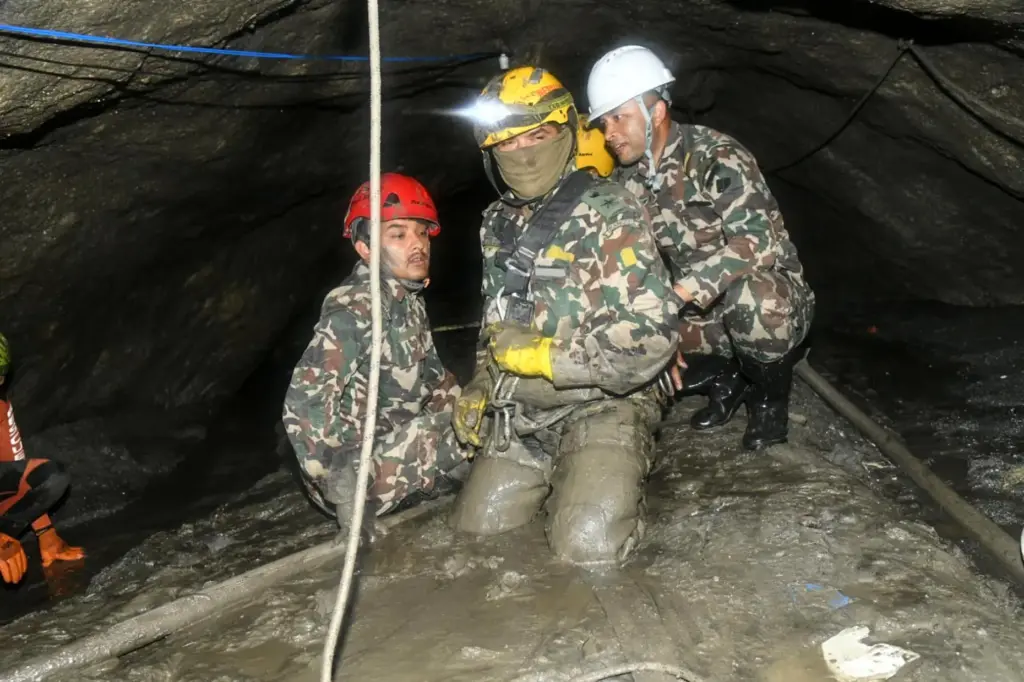 Nepalese soldiers undertake a search and rescue operation at the Chilime hydropower project.