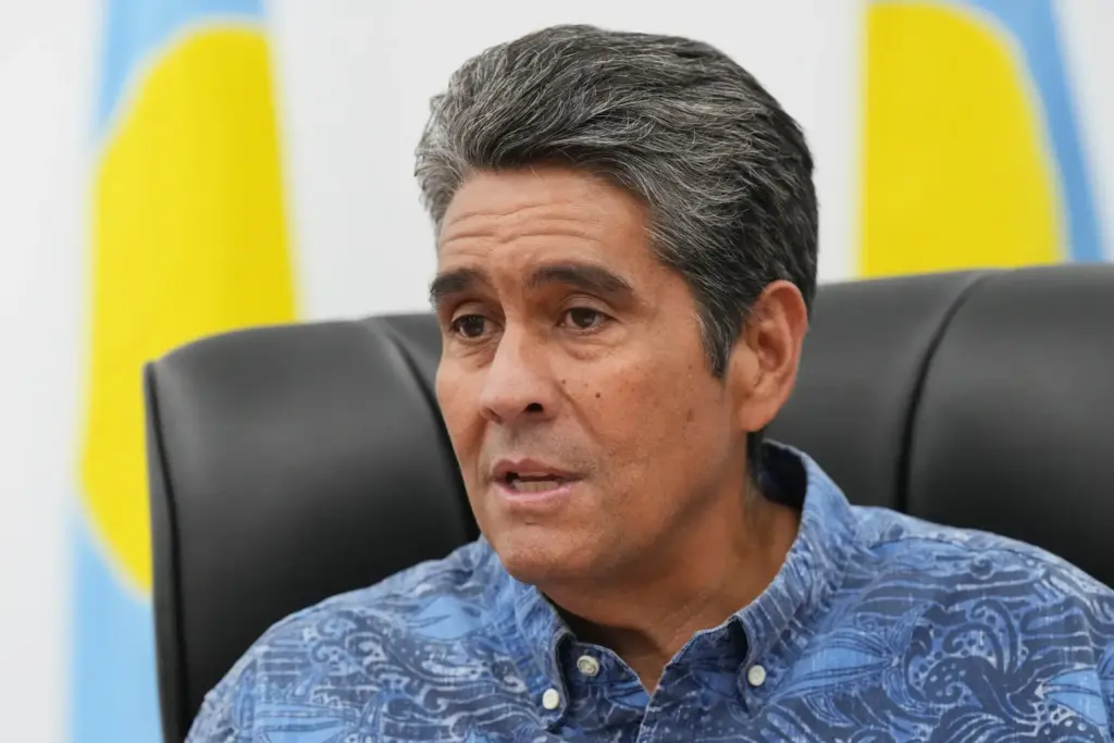 Palau's President Surangel Whipps Jr. speaks to reporters.