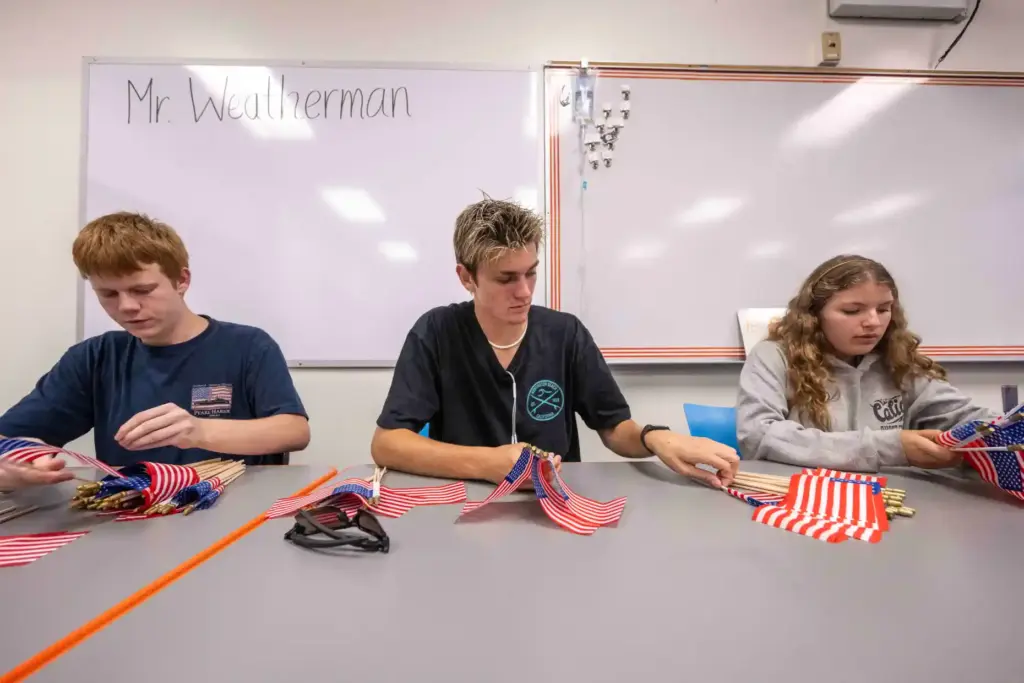 Los Alamitos High School Fire Tech program students Matthew Borgen,...
