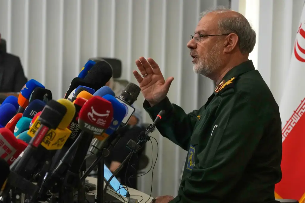 Iran's Revolutionary Guard spokesman Gen. Hossein Mohebbi speaks during a news conference.
