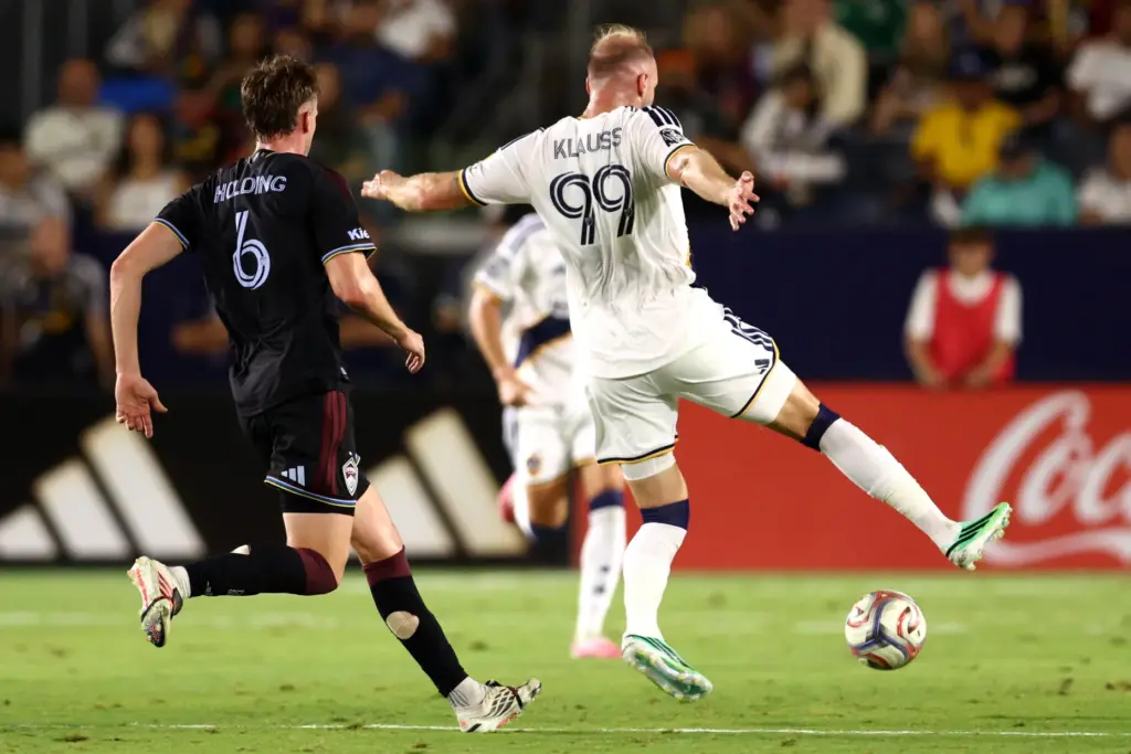 Galaxy forward JoÃ£o Klauss (99) attempts to recover the ball...