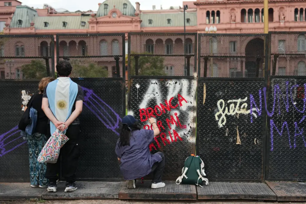 An anti-government protester writes 