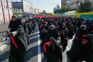 Iranians rally by the hundreds of thousands in biggest show of defiance since war began