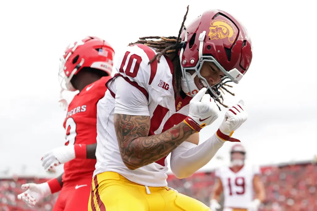 USC wide receiver Corey Simms (10) celebrates after scoring a...