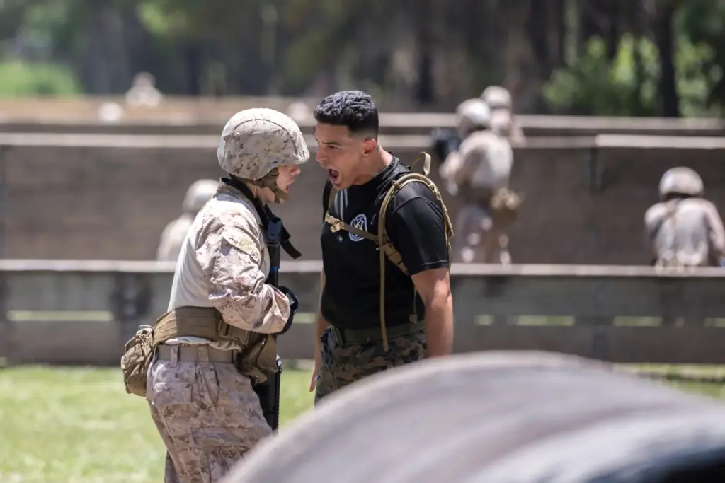 FILE – A U.S. Marine Corps tactical advisors trains a...