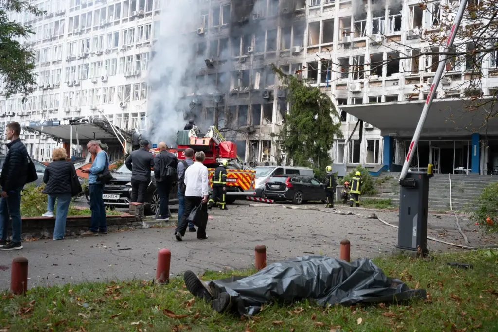 The body of a victim lies on the ground following a Russian drone strike in Kyiv.