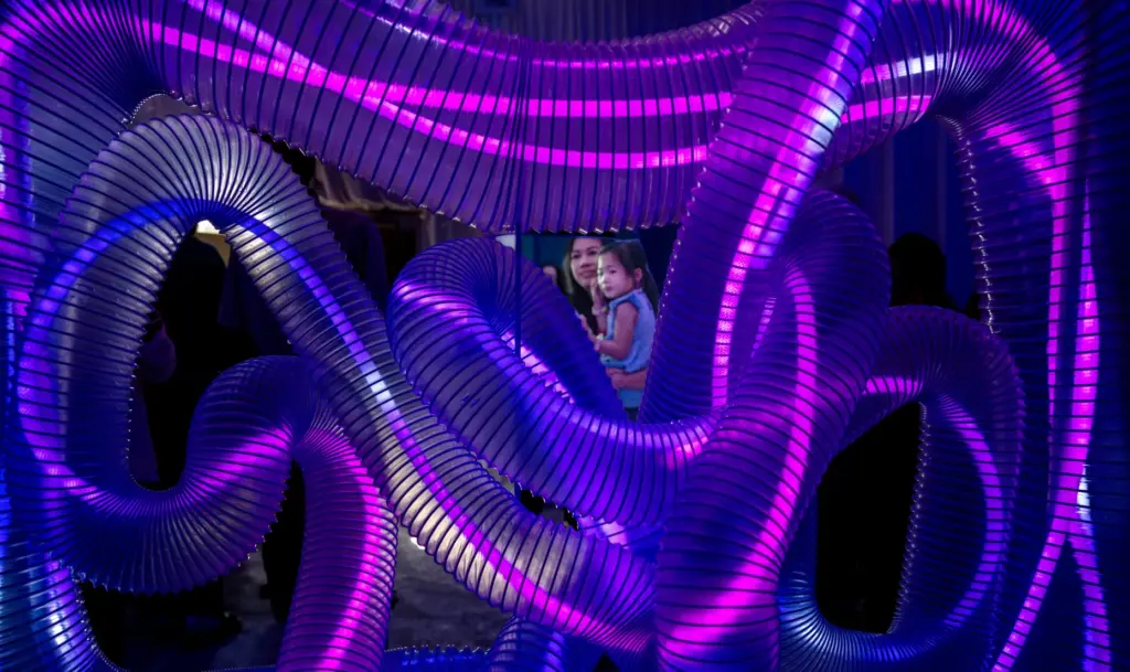Eye-popping lights accentuate parts of the human body at the”World...