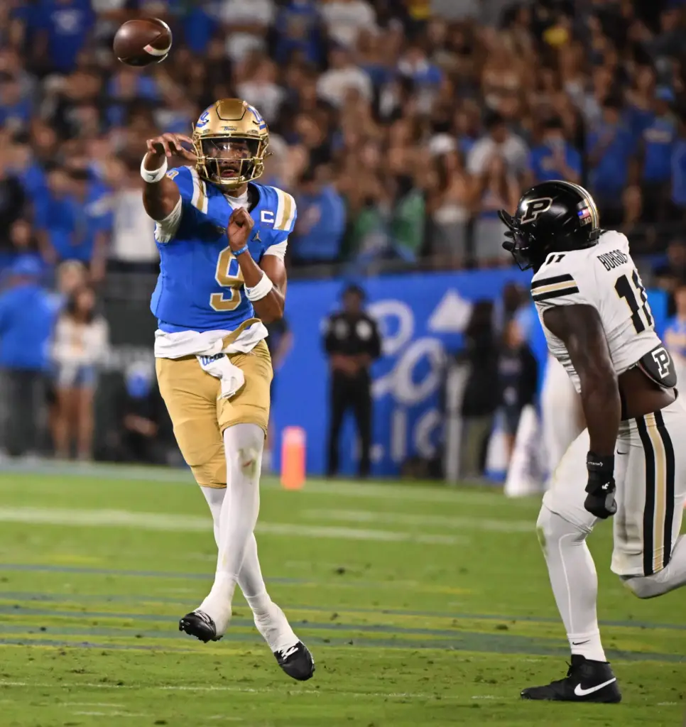 Quarterback Nico Iamaleava (9) of the UCLA Bruins passes against...