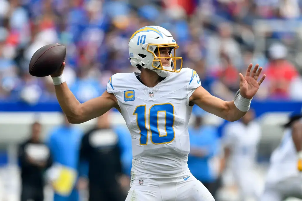 Chargers quarterback Justin Herbert throws a pass during the second...