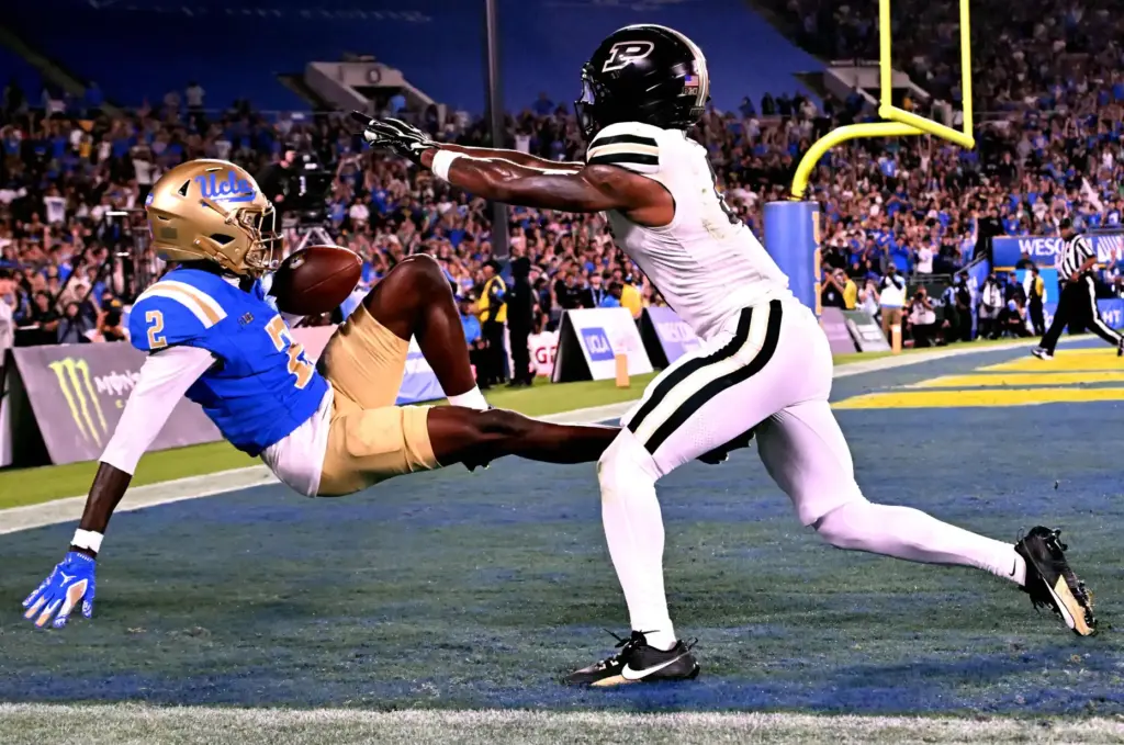 Wide receiver Brian Rowe Jr. (2) of the UCLA Bruins...