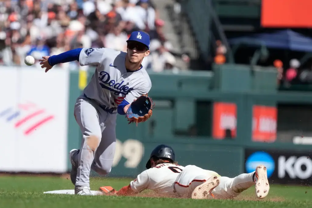San Francisco Giants’ Drew Gilbert (0) steals second base as...