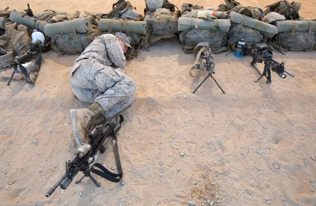 FILE – U.S. Marine Lcpl. Scott Rucker, of Tampa, Fla.,...